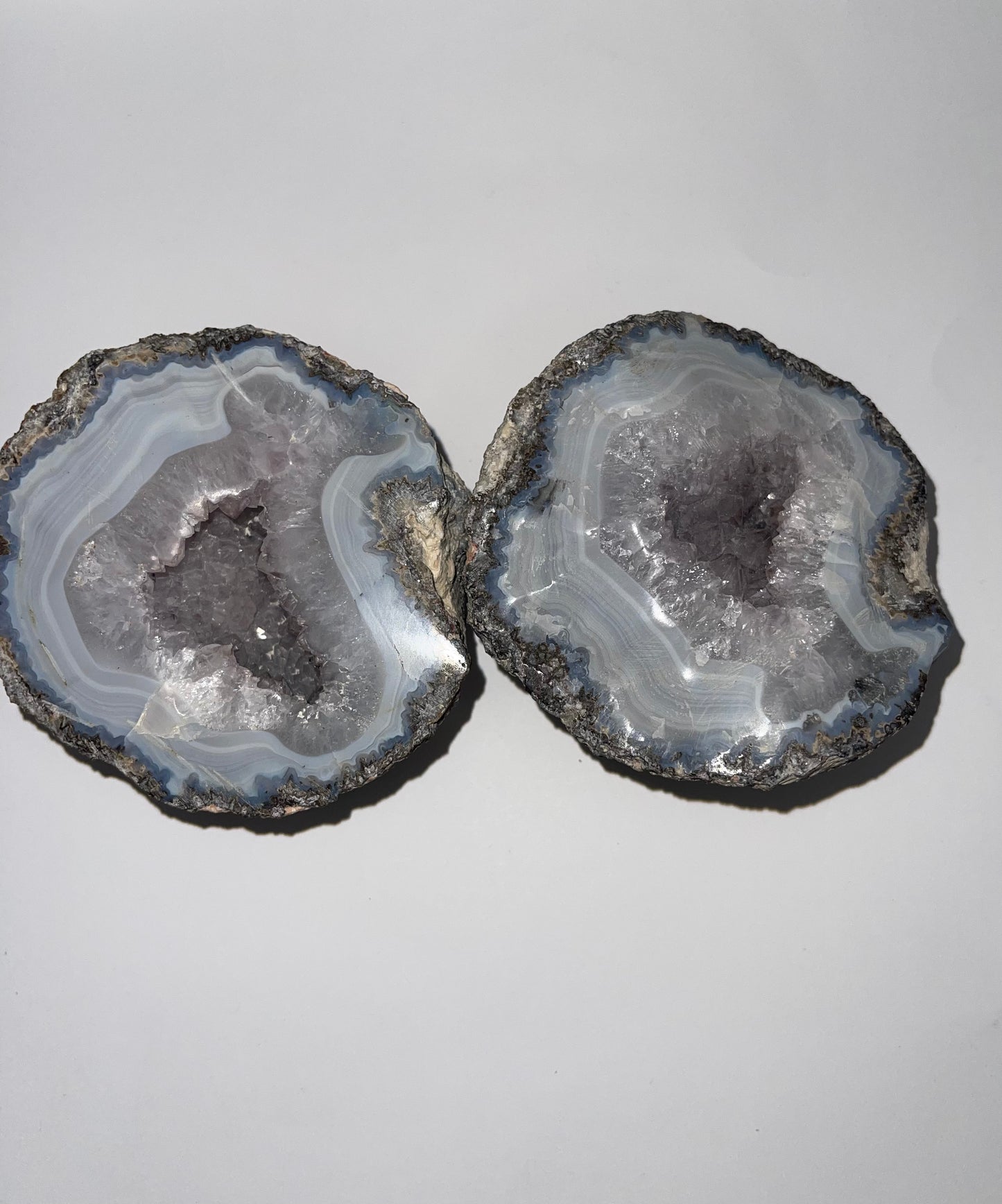 Raw blue lace agate geode half